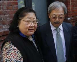 Rose Pak meets with Mayor Ed Lee after the mayor toured a fire-damaged apartment building at 920 Montgomery Street with Board of Supervisors President David Chiu in San Francisco on Saturday. The two-alarm blaze that broke out early New Year's Day displaced 48 residents.