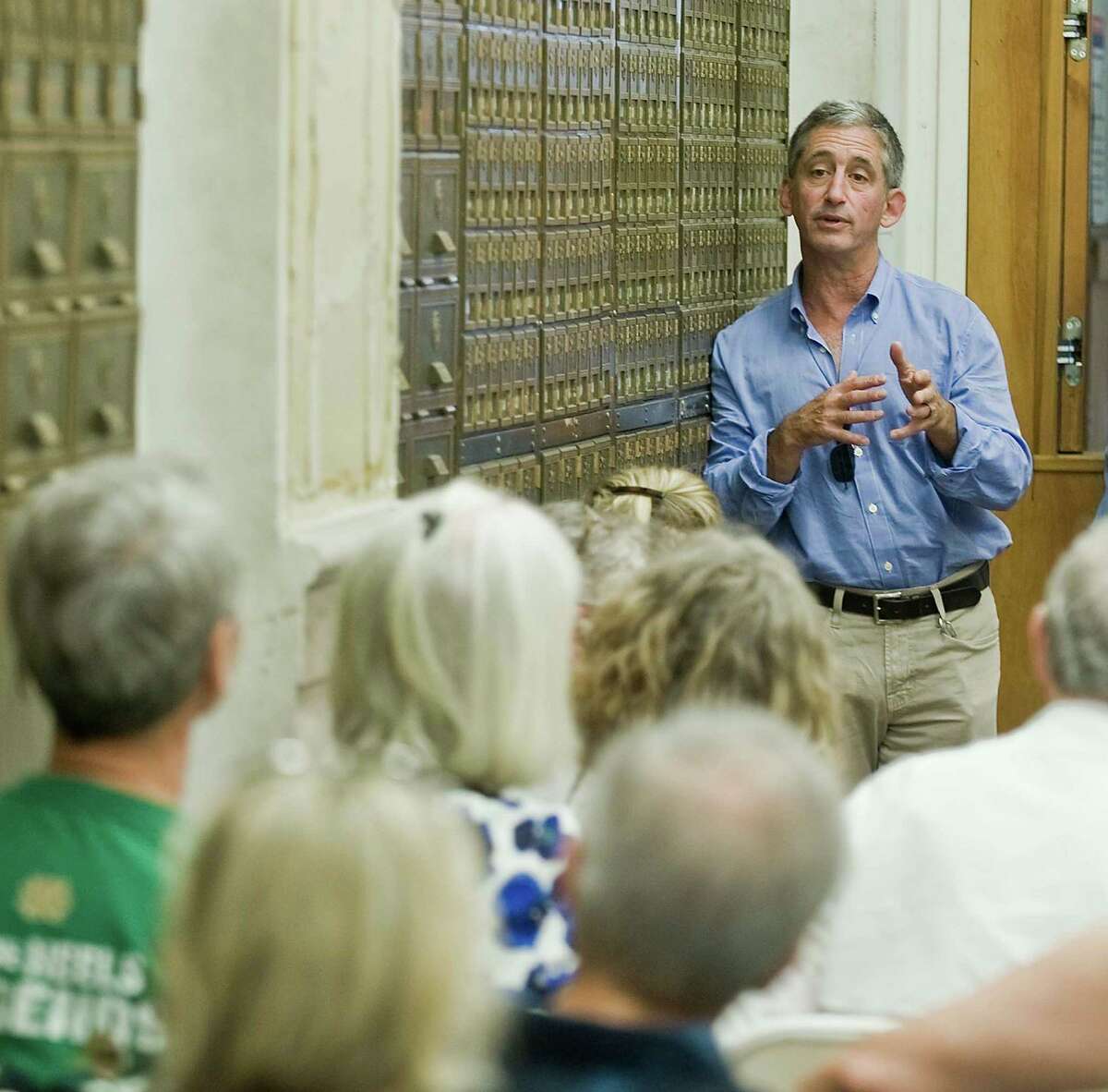 Bruce Berg, Chief Executive Officer, Cappelli Organization, answers questions by visitors about the Post office. The city of Stamford's historic preservation advisory commission hosts a 375th anniversary celebration centered around the plans to retain and restore the historic Atlantic Street Post Office. Saturday, Sept. 17, 2016