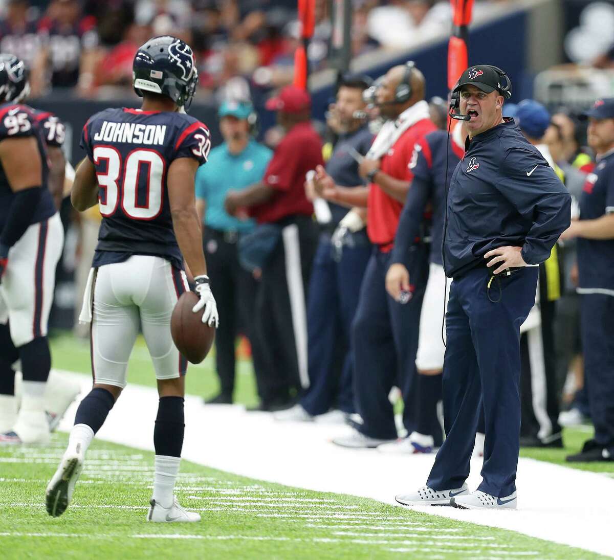 Houston Texans head coach Bill O'Brien as yells as cornerback Kevin Johnson (30) comes back to the bench during the first half of an NFL football game at NRG Stadium, Sunday, Sept. 18, 2016 in Houston.
