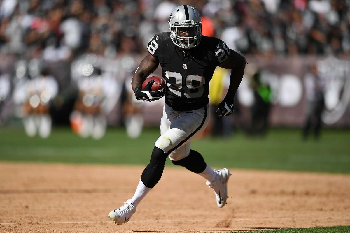OAKLAND, CA - SEPTEMBER 18: Latavius Murray #28 of the Oakland Raiders rushes with the ball against the Atlanta Falcons during their NFL game at Oakland-Alameda County Coliseum on September 18, 2016 in Oakland, California. (Photo by Thearon W. Henderson/Getty Images)