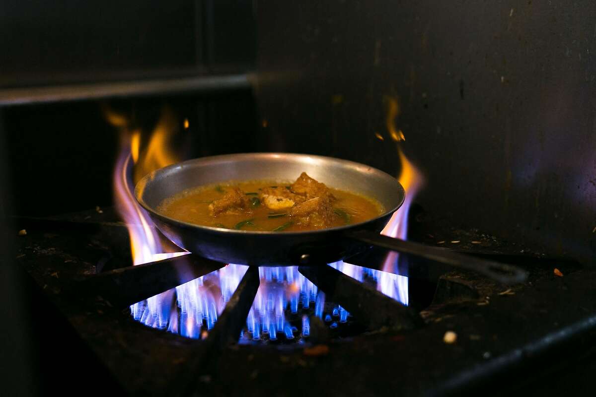 Curry cooks on the stove at Cuisine of Nepal in S.F.