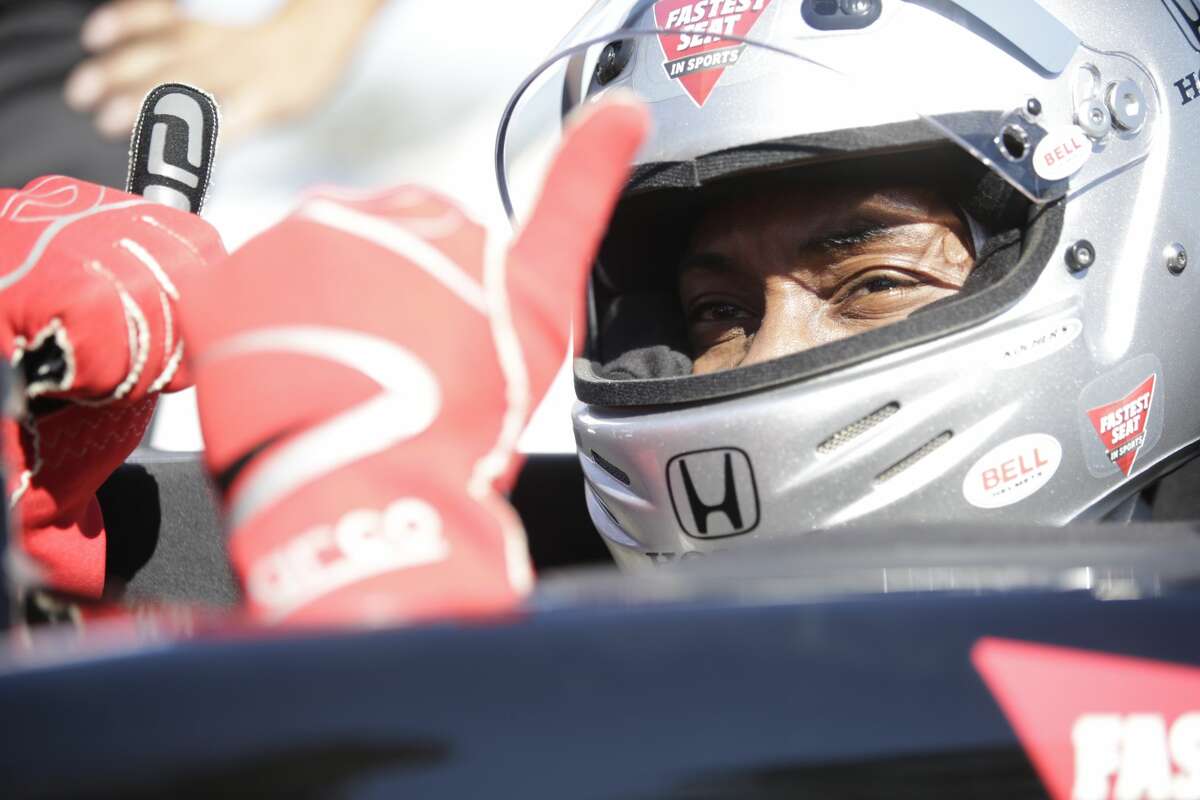 San Antonio Spur Kawhi Leonard hopped into a tandem two-seat race car with legendary driver, Mario Andretti, at the IndyCar GoPro Grand Prix of Sonoma on Sunday, Sept. 18, 2016.