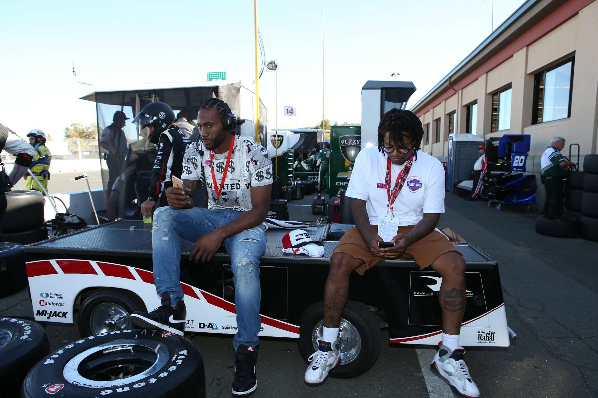 Kawhi Leonard smiles, goes racing with Mario Andretti at IndyCar 