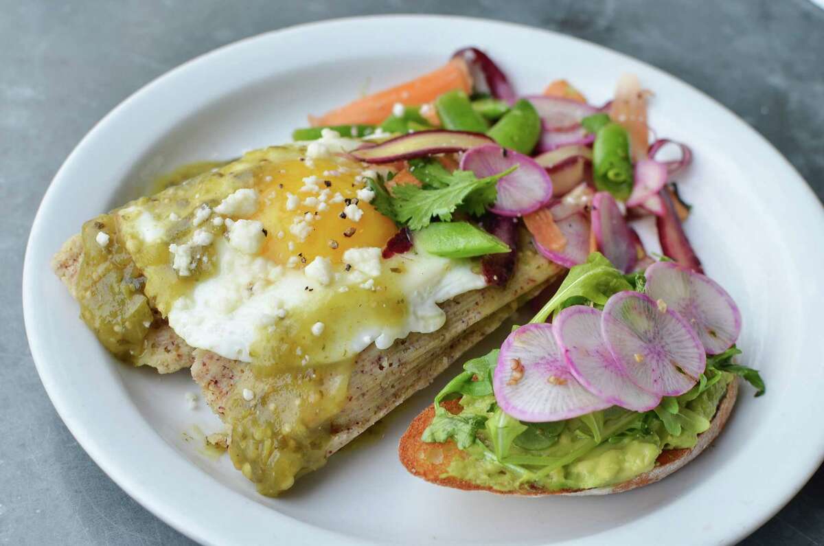 Tamales, local spring vegetables, fried yard egg, side of avocado toast at Revival Market