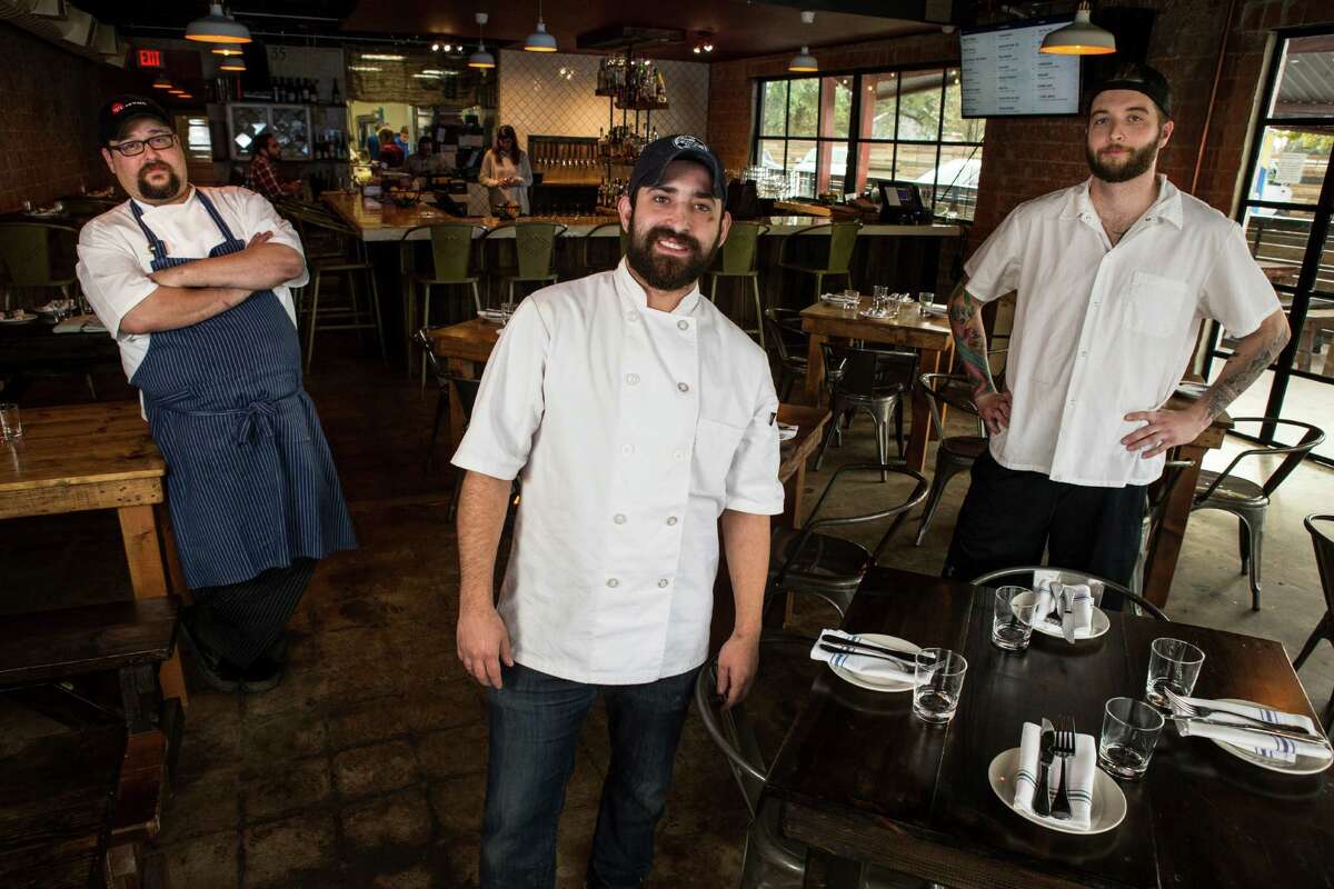 Lyle Bento, executive chef, center, J.D. Woodward, left, and Patrick Feges in the dining room at Southern Goods in 2015. The three chefs have all moved on to other projects. >>See other dining options in the Heights in the photos that follow...