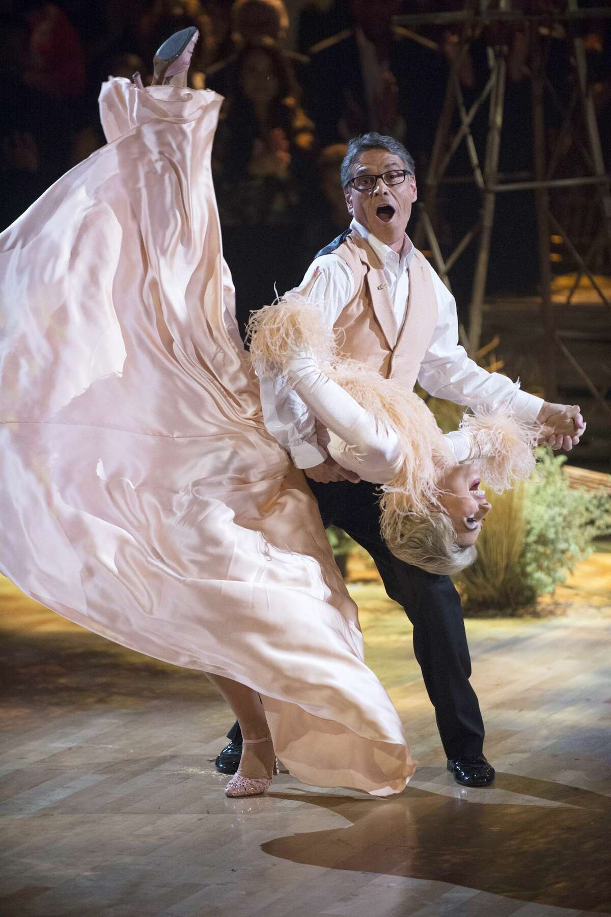 DANCING WITH THE STARS - "Episode 2302" - Rick Perry dips his partner Emma Slater in a farm-set dance to the 'Green Acres' theme song on TV night of the competition show. MONDAY, SEPTEMBER 19 on the ABC Television Network. (ABC/Eric McCandless)