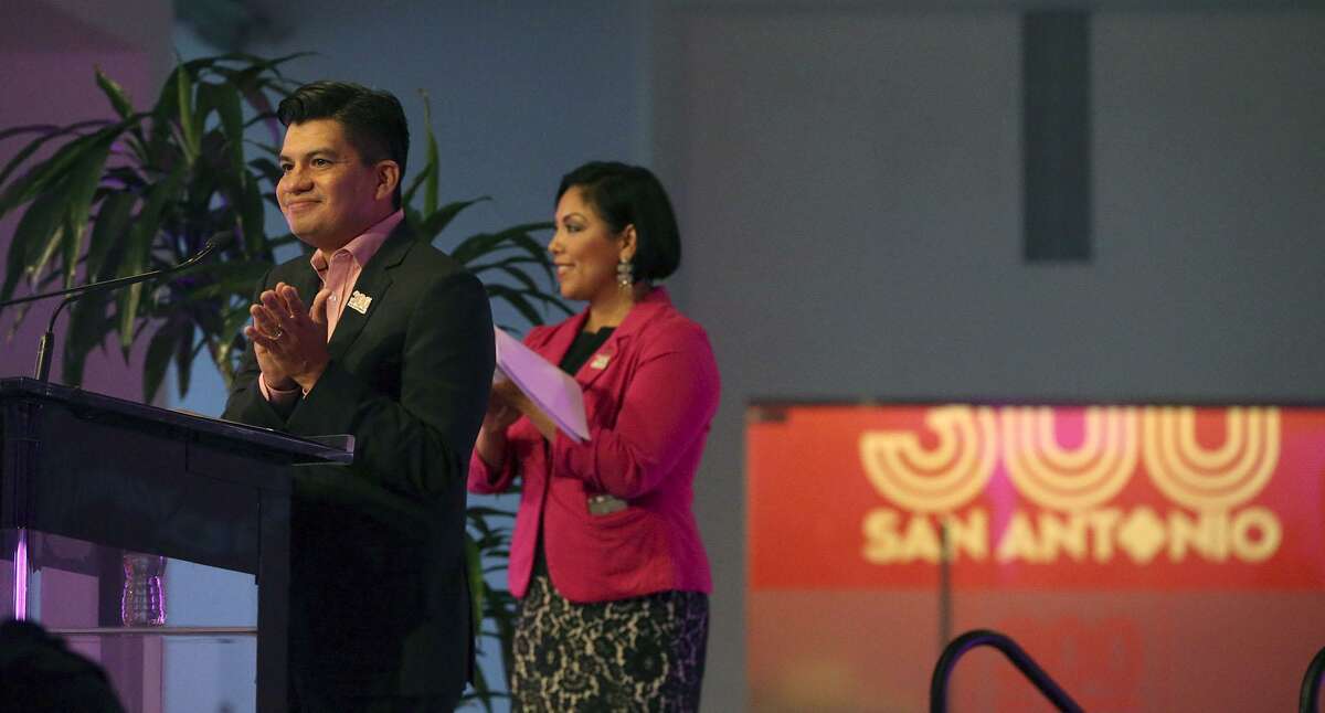 Edward Benavides, with the City of San Antonio, greets people at the announcement of the formation of the San Antonio Tricentennial Commission. The event begins on May 1-6, 2018 and will celebrate San Antonio's 300 years of life commemorating San Antonio's art, culture, history and presence on the gobal stage. The event was held at the Centro de Artes Building at Market Square.