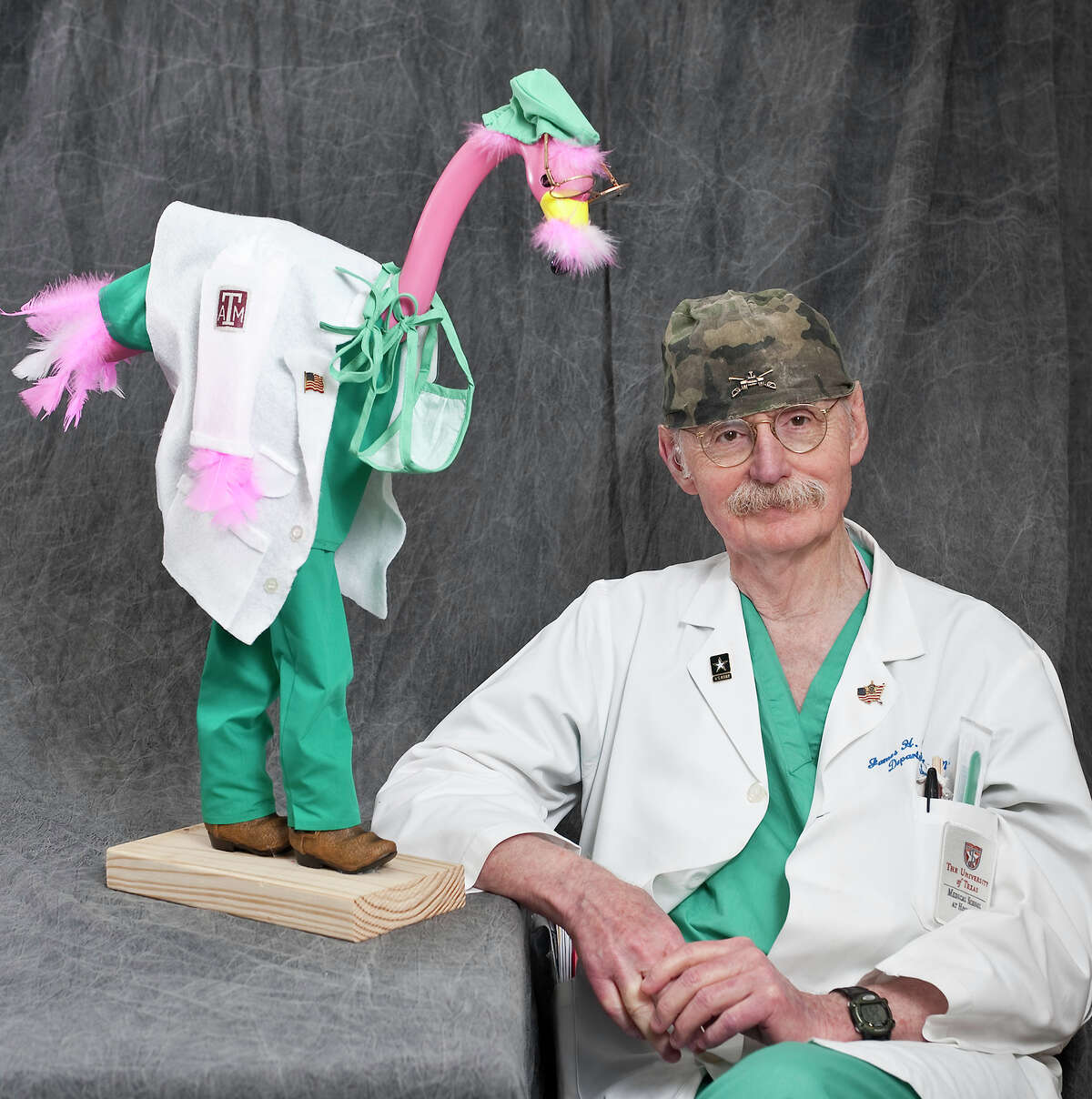 Will the real Dr. Red Duke please step forward? The trauma surgeon poses with award-winning Memorial Hermann pink flamingo, dressed to look like him.