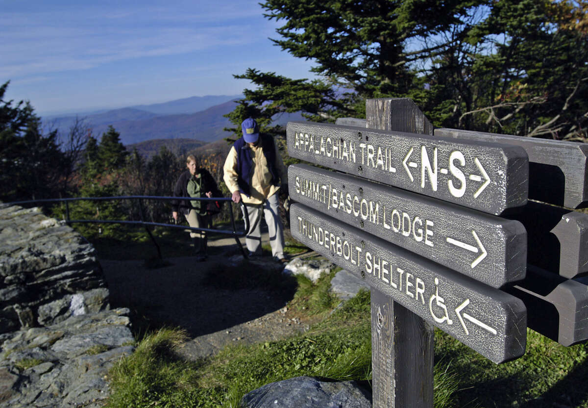 ** FOR IMMEDIATE RELEASE **Hikers are shown as they walk part of the Appalachian Trail atop Mount Greylock in Lanesboro, Mass. on Wednesday, Oct. 13, 2004. The entire Appalachian Trail, runs from Georgia to Maine. The Massachusetts portion, covers the western territory of the state from Mt. Washington to Williamstown and includes trails to the state's highest peak, Mt. Greylock, at 3,491 feet. Dalton, Mass. is one of the few places on the trail where it actually follows city streets. (AP Photo/Nancy Palmieri)