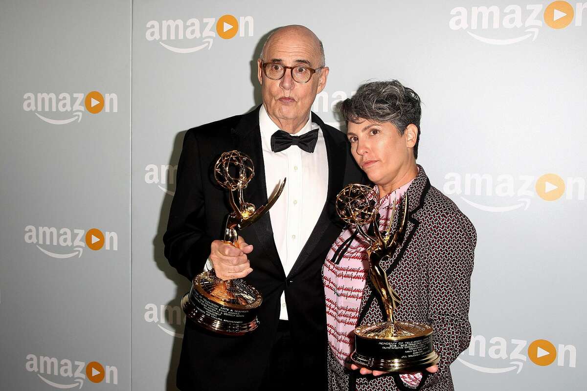 Actor Jeffrey Tambor (L) and television writer and director Jill Soloway attend the Amazon Emmy Award afterparty at Sunset Tower, in West Hollywood, California, on September 18, 2016. / AFP PHOTO / TOMMASO BODDITOMMASO BODDI/AFP/Getty Images