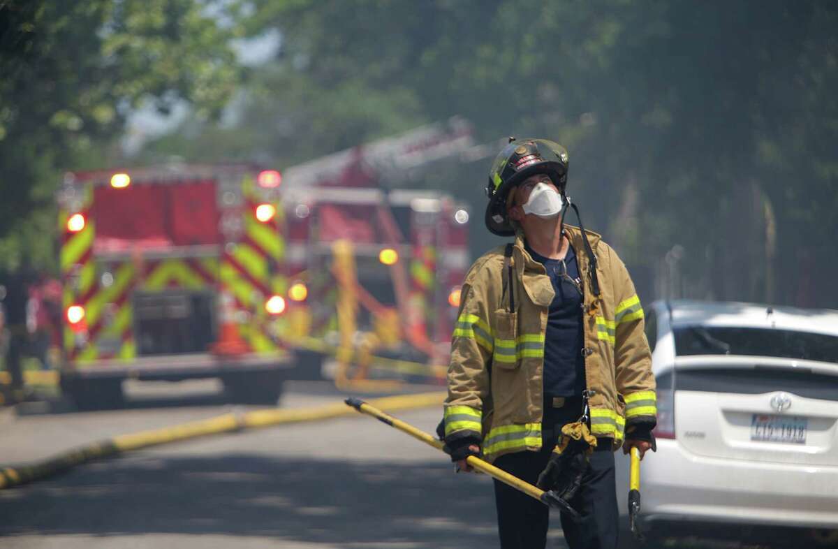 Four hundred firefighters responded to the Spring Branch warehouse over two days and didn't know what chemicals were on site. (Mark Mulligan / Houston Chronicle )