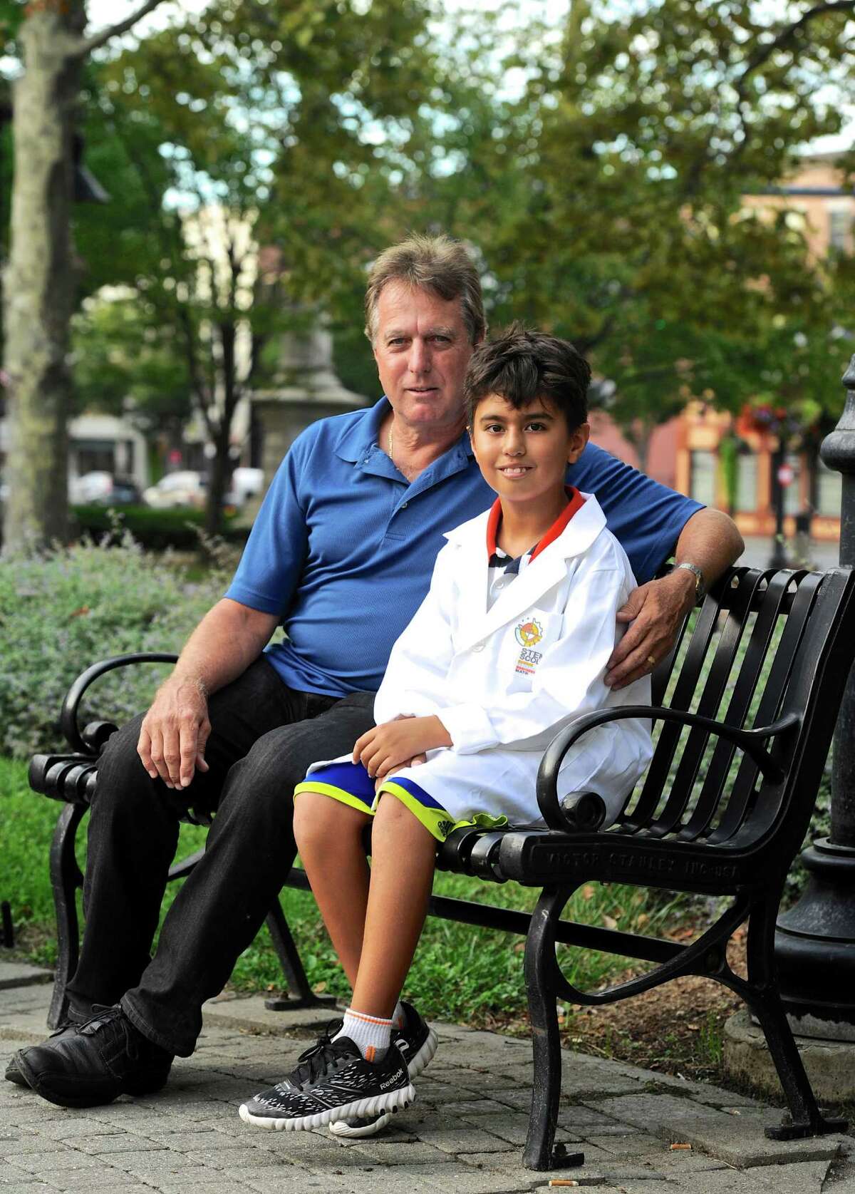 Gary Prybylski Jr, 9, of Danbury, and his father Gary Prybylski Sr sit on a bench in front of the Danbury Public Library on Tuesday afternoon, September 20, 2016, in Danbury, Conn. The library is meeting place of the new STEM Scouts Danbury Library Elementary School Lab #1010, which is part of the Boy Scouts. Prybylski Sr brought the new scouting program to Danbury. The group will be holding a sign-up & demo at the Danbury War memorial on Monday, September 26th, from 5:30 to 6:30 pm.