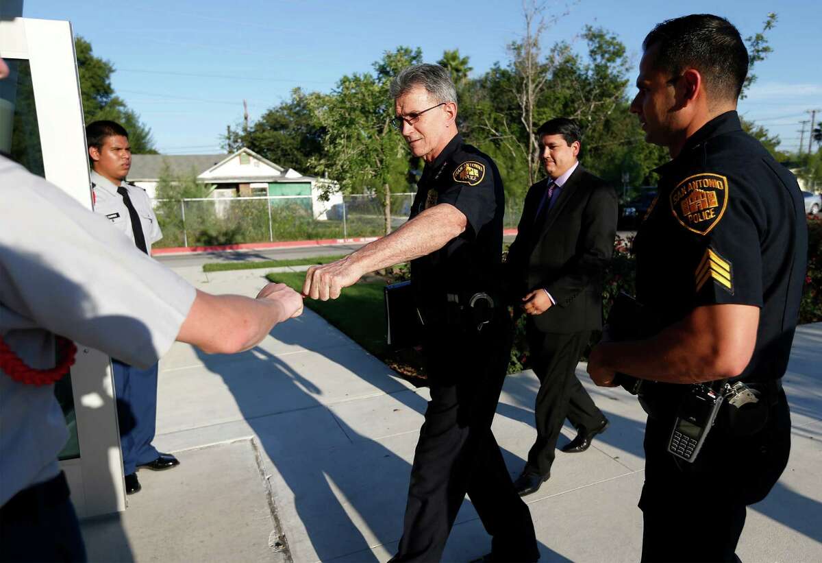Police Chief William McManus (center) greets Christopher Kimerer, a sophomore ROTC student at Sam Houston High on Wednesday, Sept. 21, 2016. On Wednesday night, the city is holding the first meeting of the Mayor?’s Council on Police-Community Relations (CPCR), at the Career & Technical Education building at Sam Houston High School, 4635 E. Houston St., 78220. The council includes almost three dozen community leaders, including a former county commissioner, religious leaders, a candidate for the Texas House of Representatives, police union members and a representative for a current state rep. will be in attendance. (Kin Man Hui/San Antonio Express-News)