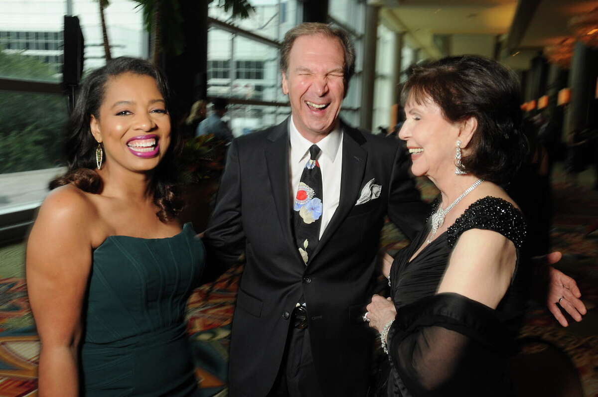 From left: Shawntell McWilliams shares a laugh with John and Shirlee Jamail at the Health Museum's Hearts of Gold Gala at the Hilton Americas Hotel Friday Sept. 16, 2016. (Dave Rossman Photo)