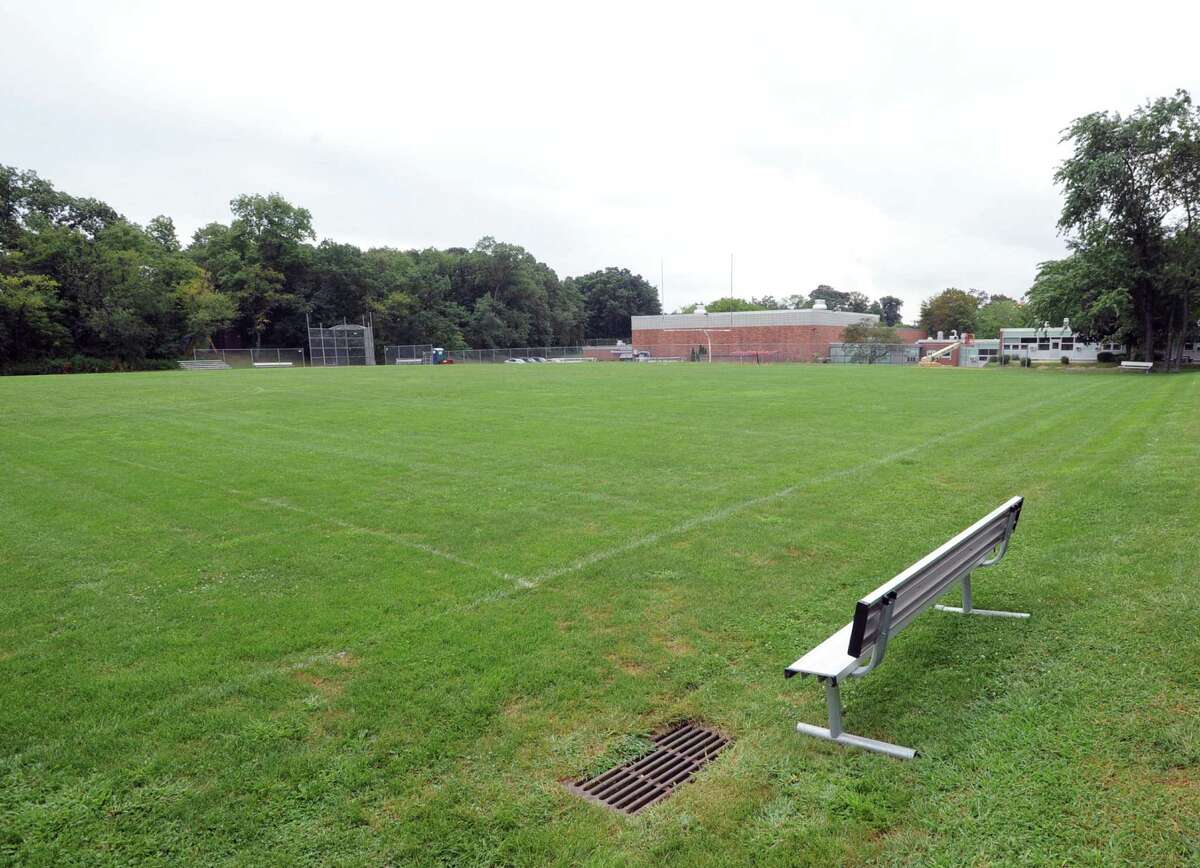 The field behind Western Middle School earlier this month. The fields were closed by town officials after tests found elevated levels of lead and other toxins in the soil.