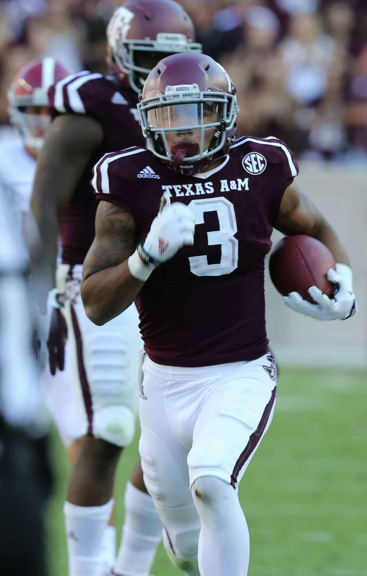 Texas A&M’s Christian Kirk makes his way to the end zone in the second quarter against Alabama on Oct. 17, 2015, in College Station.