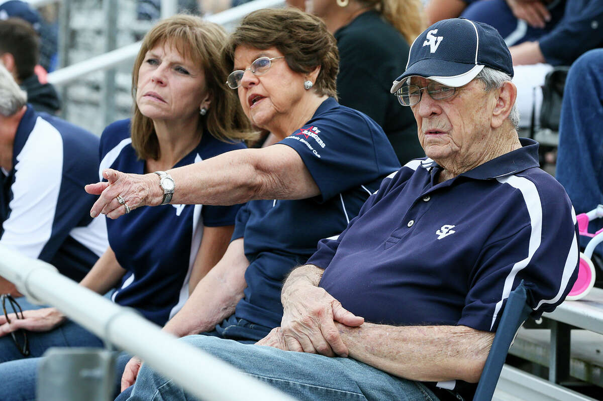 Ivan Snoga (from right), his wife Evelyn and daughter, Jill Moorman watch their grandson and son, Luke Moorman, play in a Smithson Valley junior-varsity football game against East Central at Ranger Stadium on Sept. 23, 2016. The Snogas have had 13 grandsons who have played or are currently playing football in the Smithson Valley program. Snoga sits with his family in the same spot in the stands every home game.