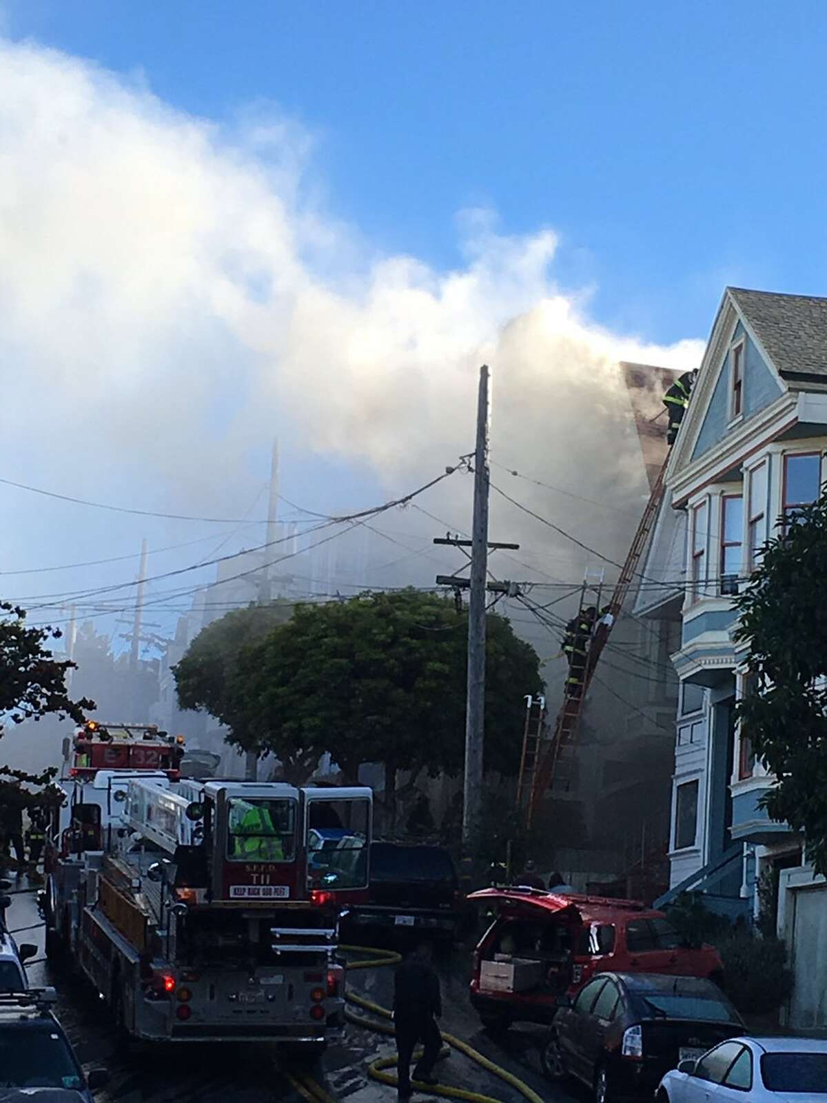 Firefighters battled a two-alarm blaze Friday morning in Bernal Heights.