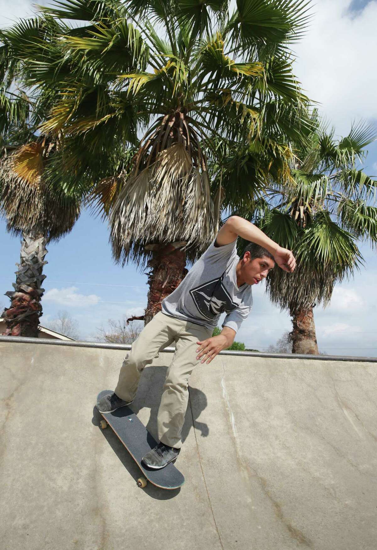 Anthony Rosales works out in the warm weather at the Jaws Skate Park in New Braunfels on March 8.