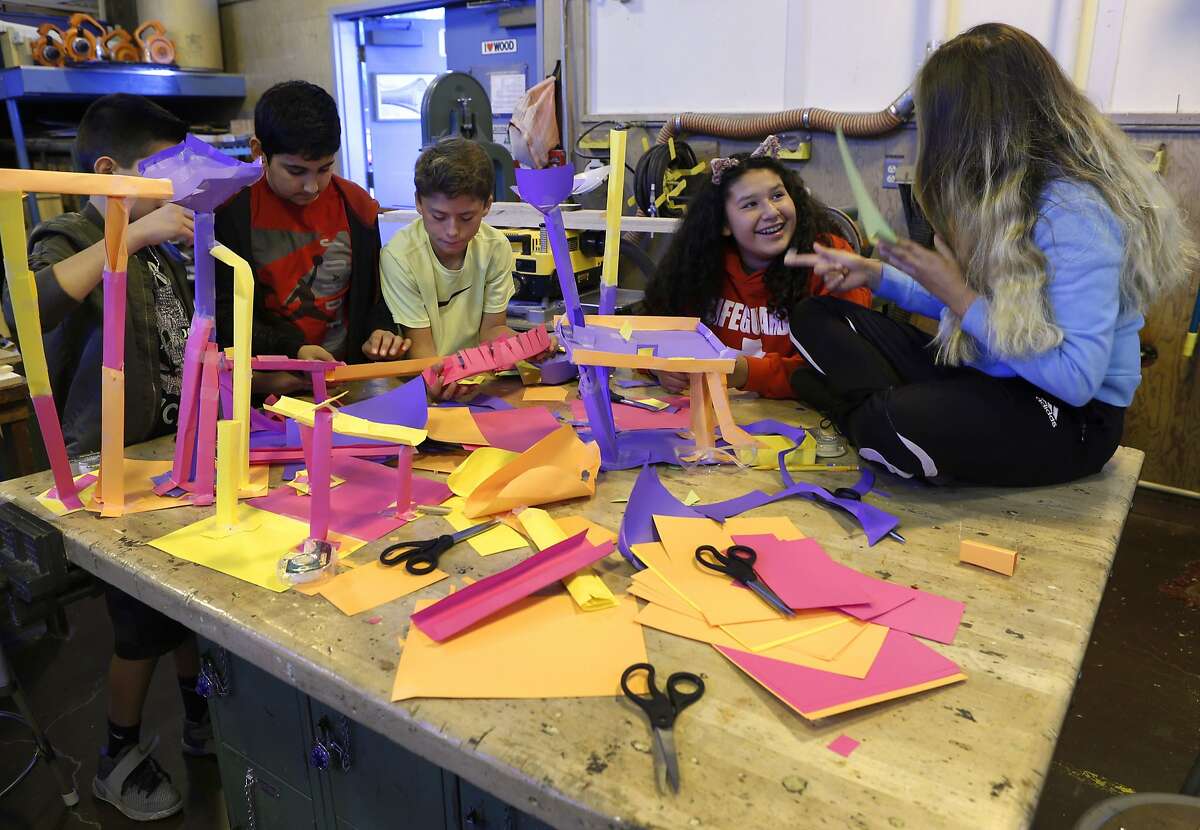 Students construct paper roller coasters for marbles in a hands-on technology class taught by Stephan Willner at Sequoia Middle School in Pleasant Hill, Calif. on Wednesday, Sept. 21, 2016. Passage of Prop. 55 on the November ballot would benefit schools by extending tax increases on individuals with incomes over $250,000 for an additional 12 years.