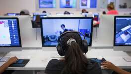 A student studies at the digital library in San Antonio. ( Marie D. De Jesus / Houston Chronicle )