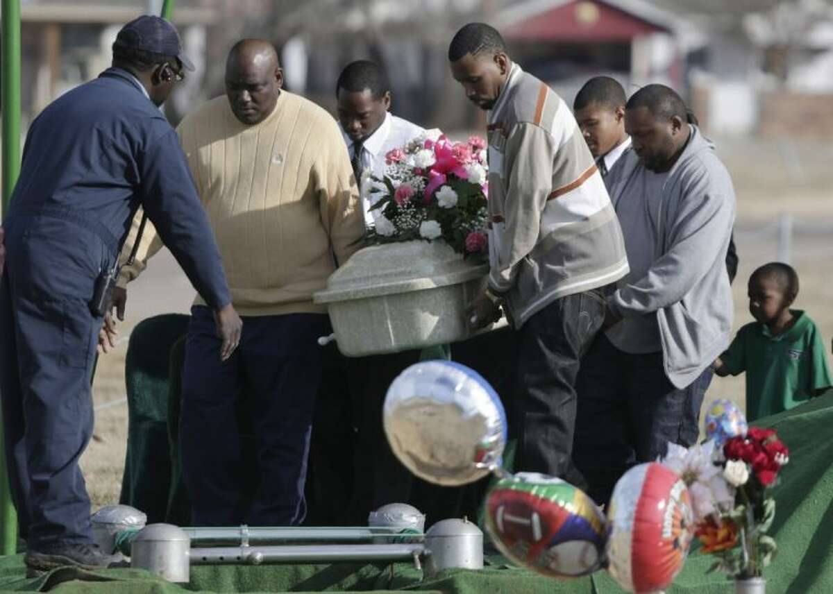 Pallbearers carry the small coffin holding six-year-old Tahlia Johnson on her way to her burial Friday in Dallas. According to Dallas health officials, Thalia’s death on Tuesday was caused by the flu. It’s unclear if she’d been vaccinated for the flu. State health officials say cases have been reported in more than half of Texas, and the intensity of flu-like symptoms is high.