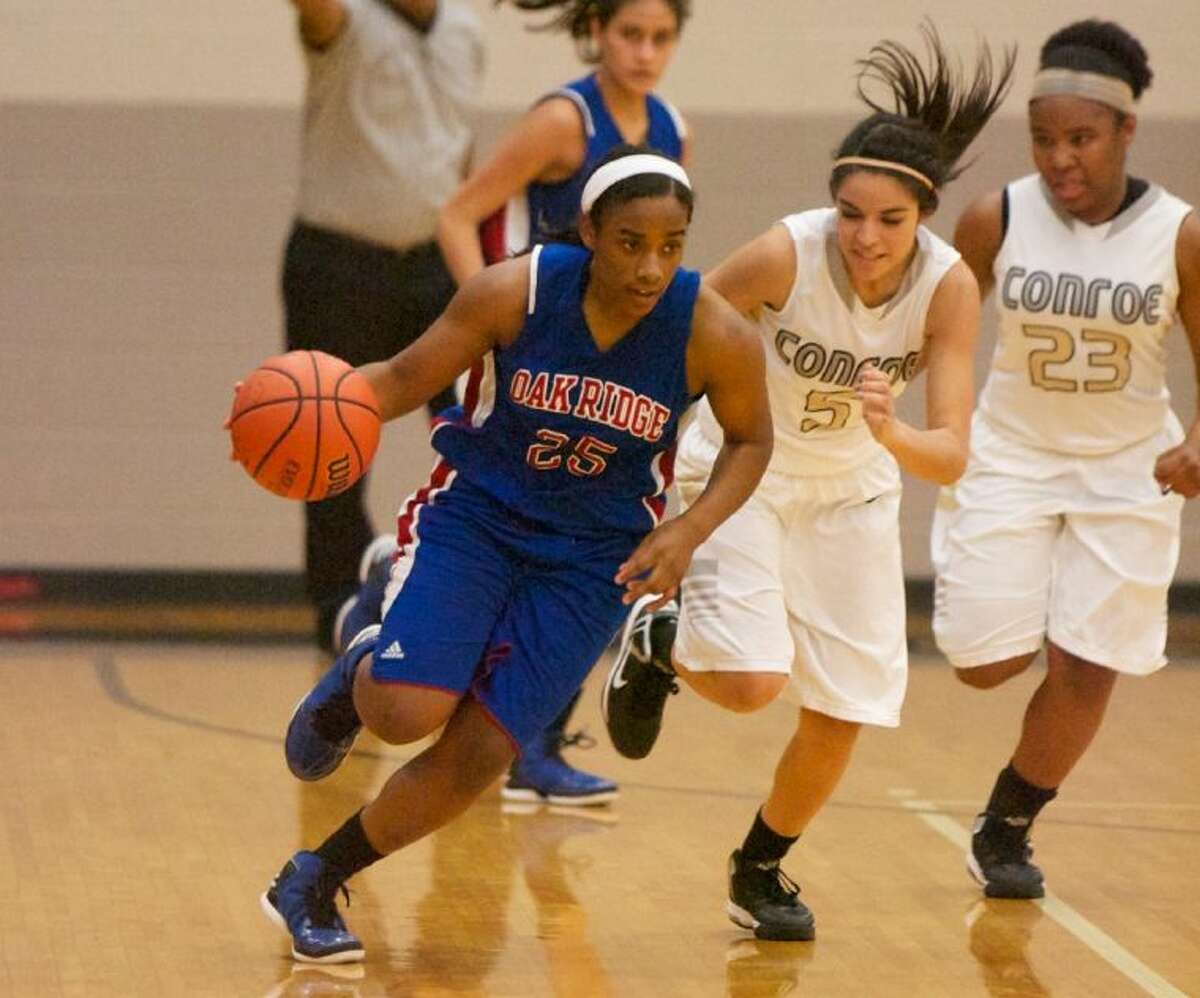 Oak Ridge's Raquel Kellow dribbles during Tuesday night's district game against Conroe.