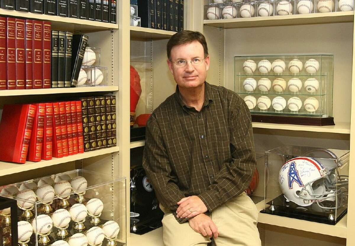 Pastor Mark Denison, of First Baptist Church of Conroe, is an avid collector of sports memorabilia.