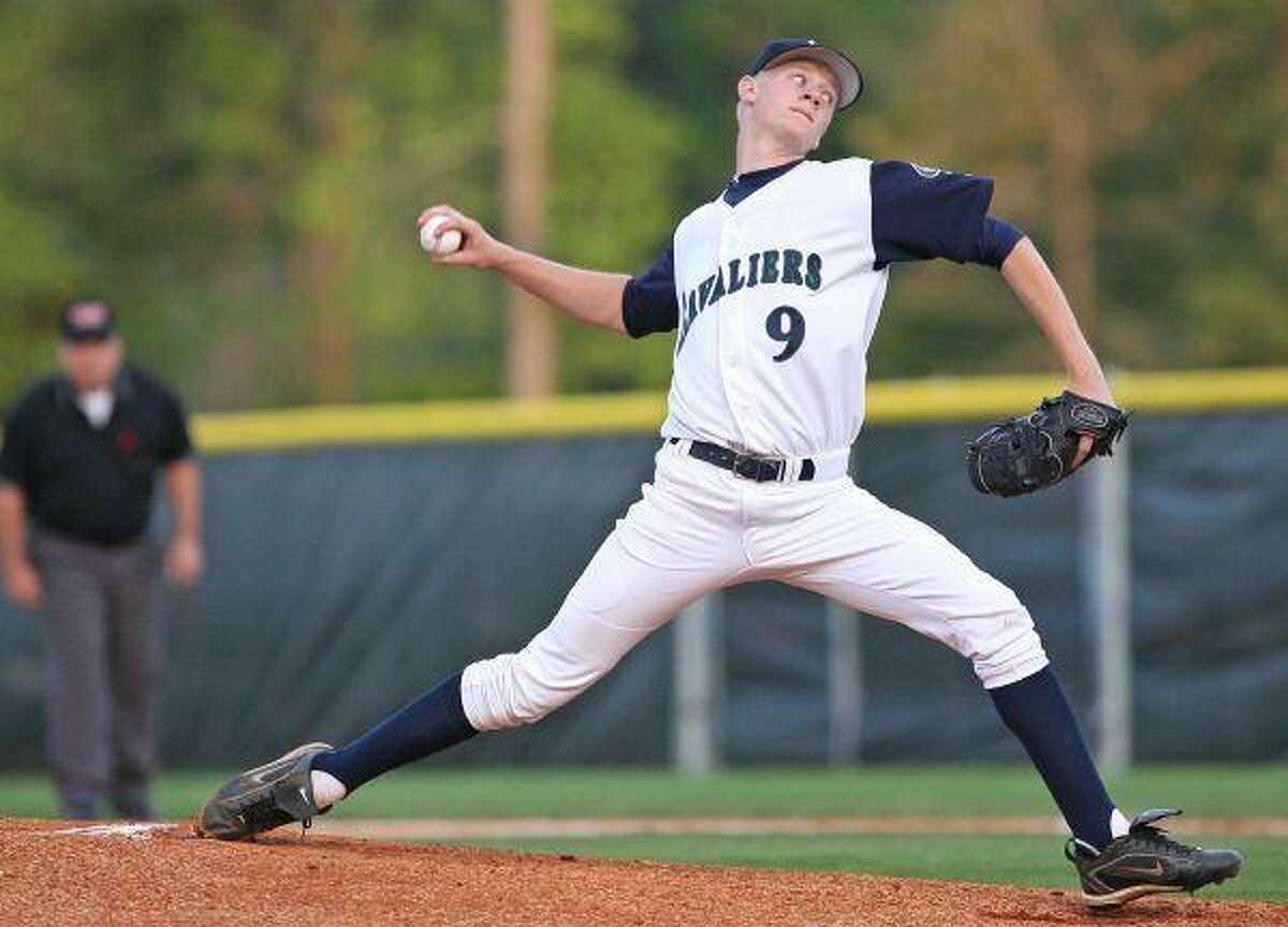 The Woodlands' Jameson Taillon pitches during a night game April