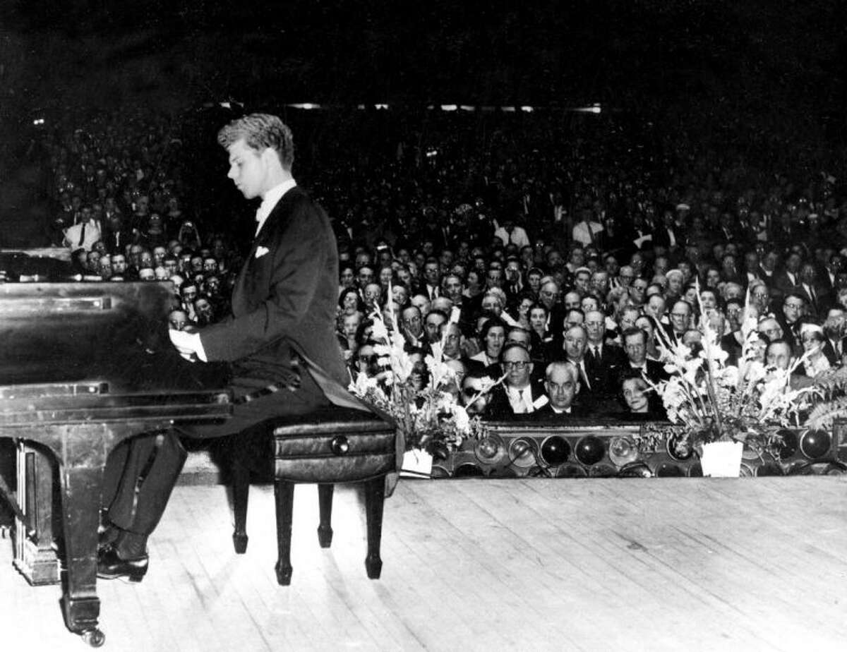 This Feb. 19, 1959 file photo shows pianist Van Cliburn performing at the Convention Hall in Atlantic, City, N.J. Cliburndied early Wednesday, Feb. 27, 2013, at his Fort Worth home following a battle with bone cancer. He was 78.