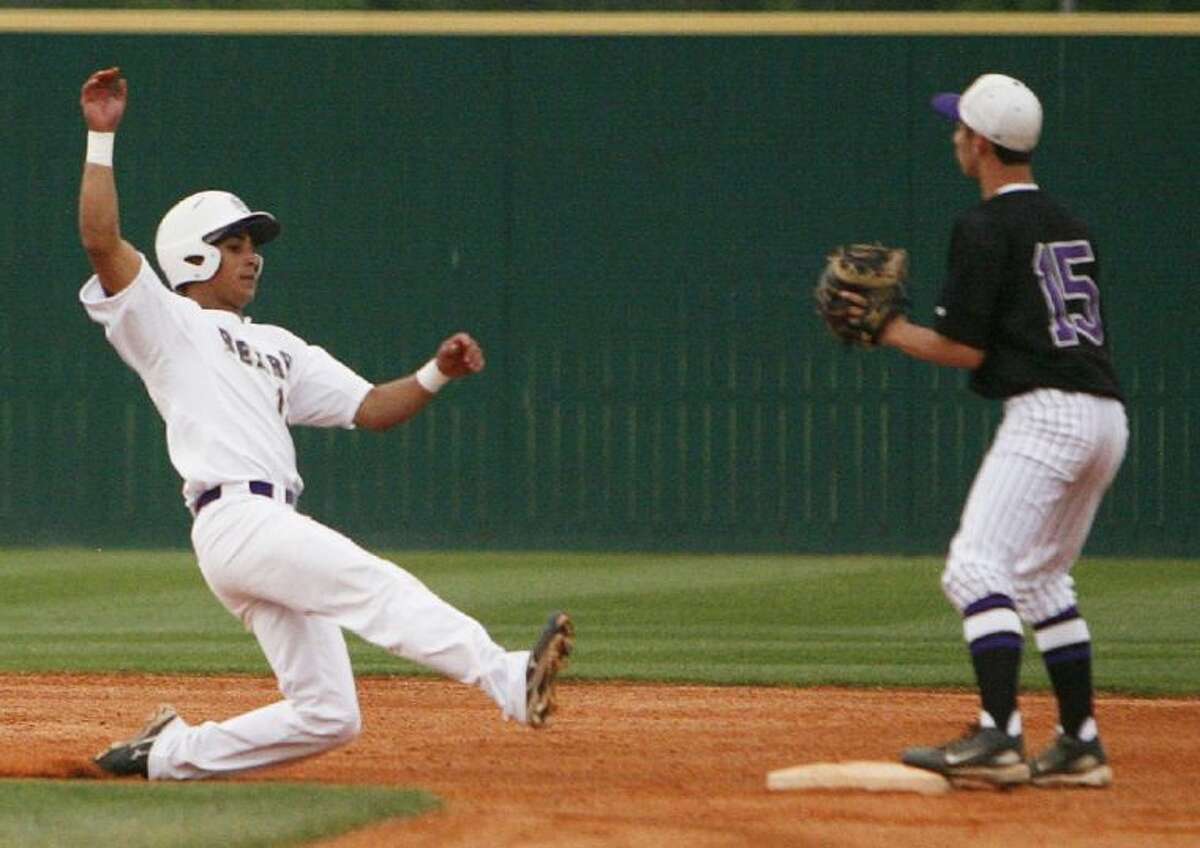 Garrett Hrozek, left, and the Montgomery Bears improved to 13-2 in District 18-4A play in Saturday night’s 8-3 victory over Rudder.