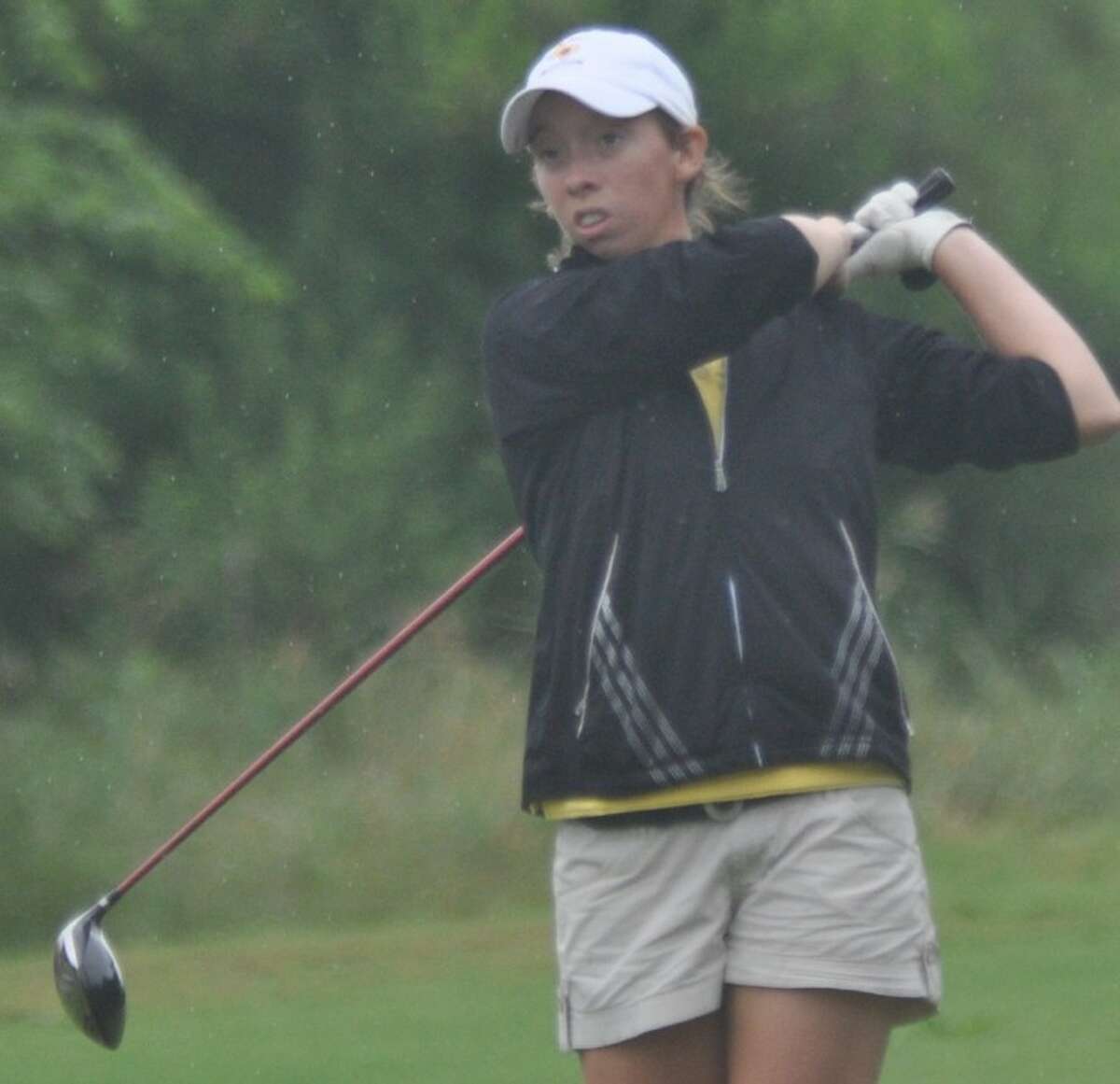 Montgomery’s Kirby Sullivan watches a drive during the Region III-4A girls golf tournament at Raven Nest in Huntsville
