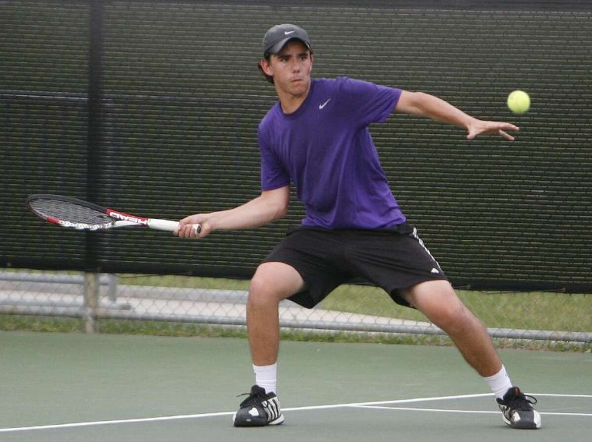 Montgomery’s Jorge Ruiz plays a forehand during Tuesday’s Region III-4A Tournament at the Blythe Calfee Tennis Center in Willis.