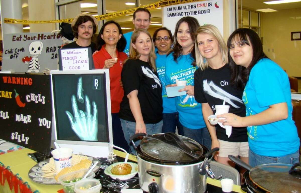 A group of Lone Star College-Montgomery’s radiologic technology students showcases their “X-Ray Chili,” one of the many crock-pot creations available to taste - and judge - at the college’s annual Healthier U Heart-Healthy Cook-Off and Bake-Off held in early April.