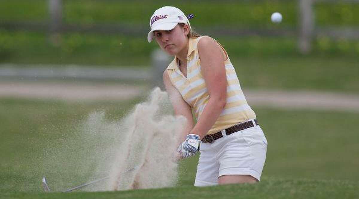 Montgomery’s Molly Jones hits out of the sand on the 4th hole Tuesday during the final round of the Region III-4A Tournament at Raven Nest in Huntsville.