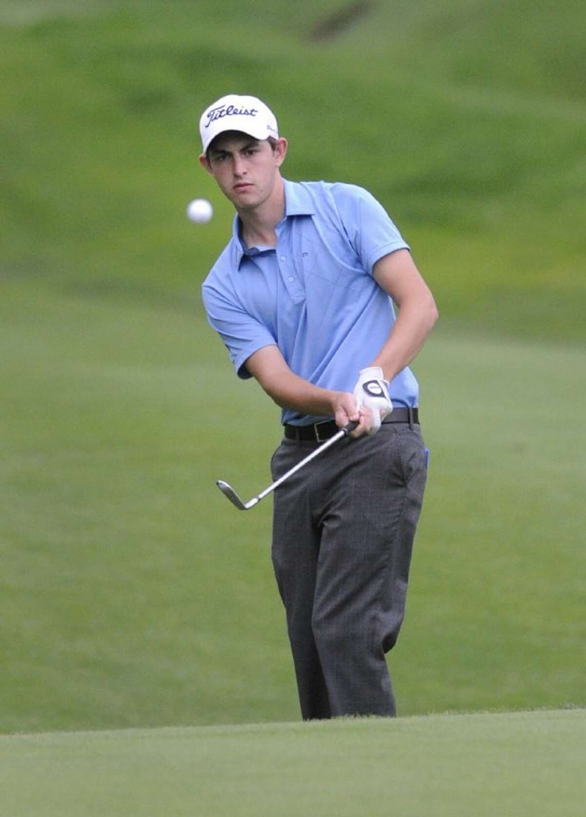 Amateur Patrick Cantlay hits his second shot on the 15th hole of his second round of the rain-delayed Travelers Championship in Cromwell, Conn., on Friday.