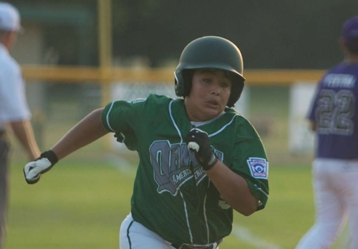 During Thursday night’s game against Montgomery, ORWALL American’s Leonardo Espinoza makes a run for home plate.