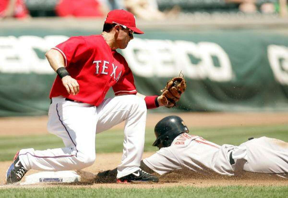 Texas Rangers second baseman Ian Kinsler rounds the bases after