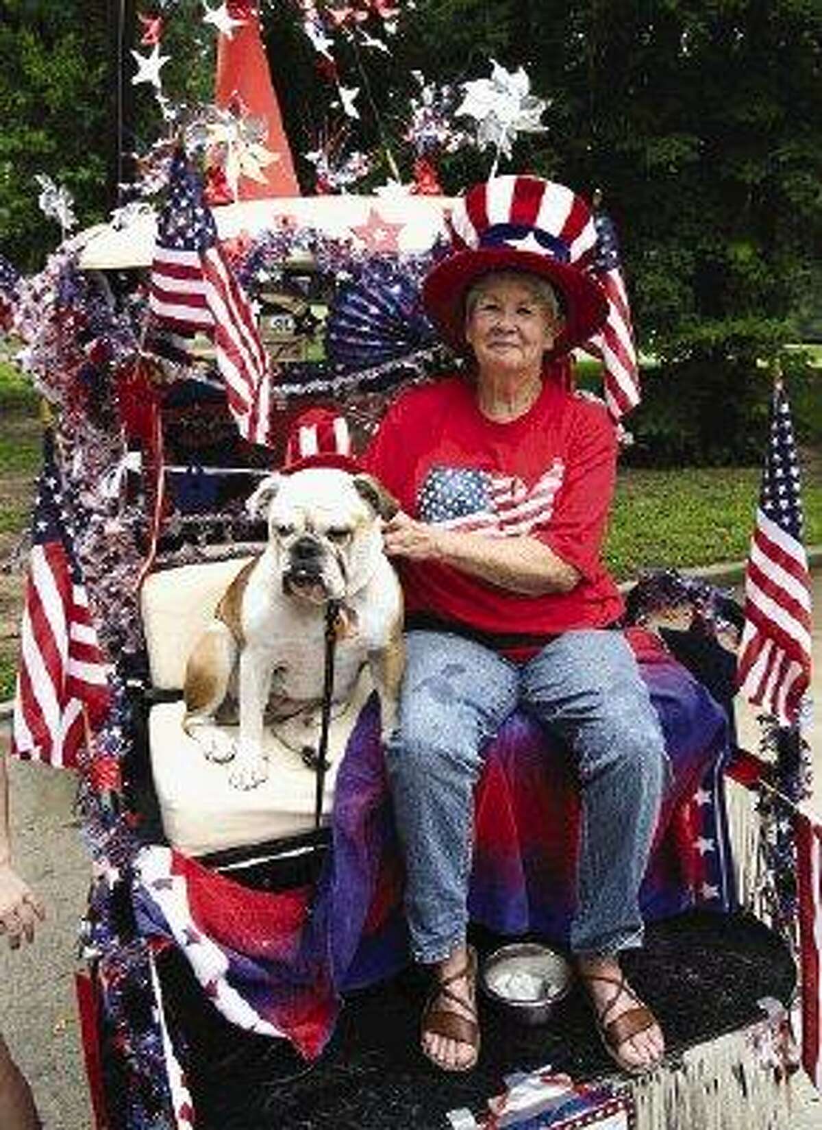 Wynona Ballard's elaborately decorated golf cart included a special passenger: Kora, her one-year-old English bulldog.