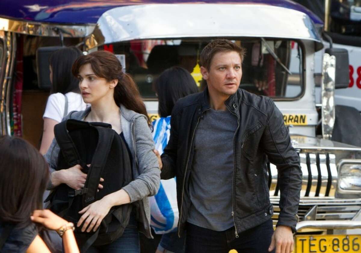 This film image released by Universal Pictures shows Rachel Weisz as Dr. Marta Shearing, left, and Jeremy Renner as Aaron Cross in a scene from "The Bourne Legacy."