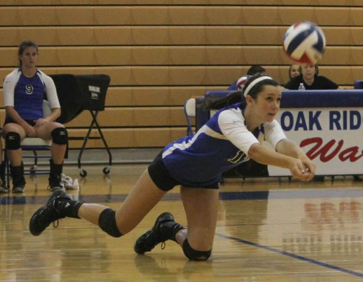 Oak Ridge’s Morgan McCoy, pictured playing against Tomball Memorial, helped the Lady War Eagles win three matches Thursday in the Magnolia Tournament.