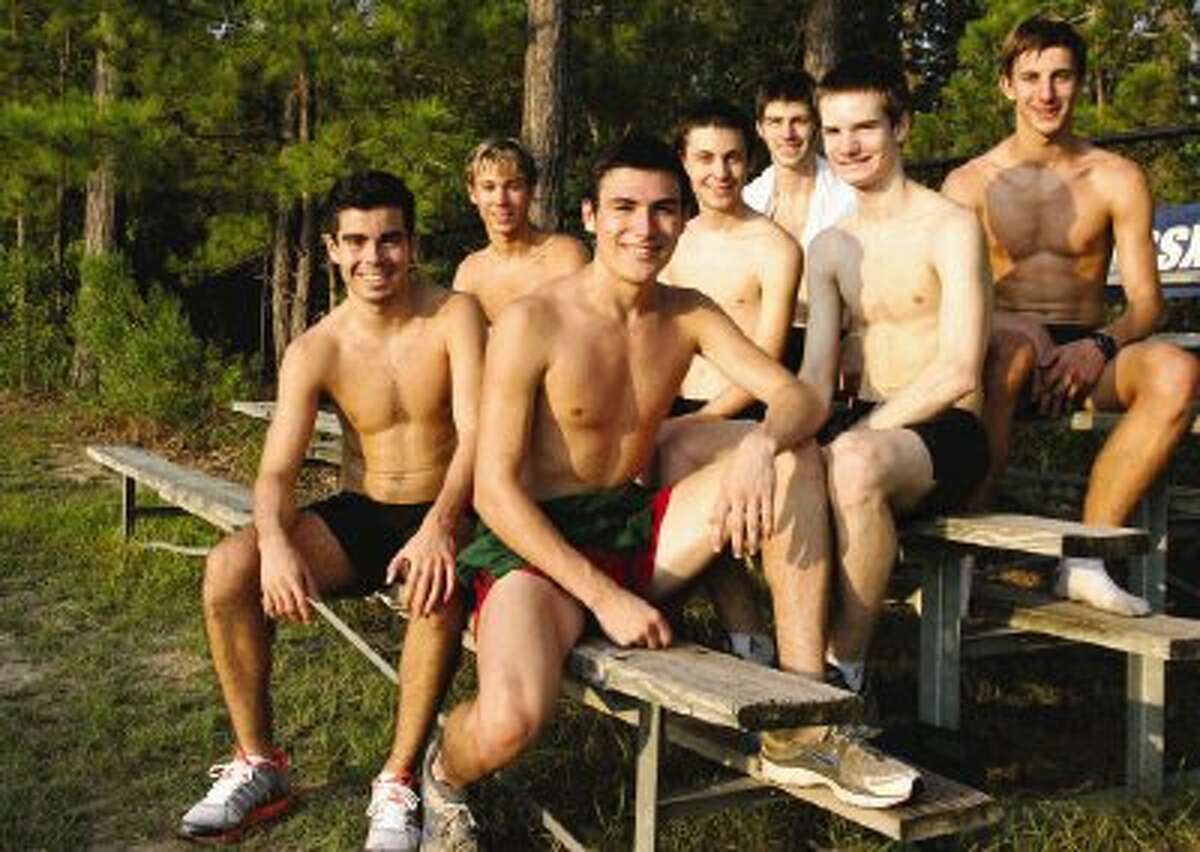 The Woodlands High School varsity cross country runners, from left, Chris Vargas, Eric Vibrock, Brigham Hedges, Jake Hendrick, Craig Irvin, Kevin Hill and Conner Moncrief.