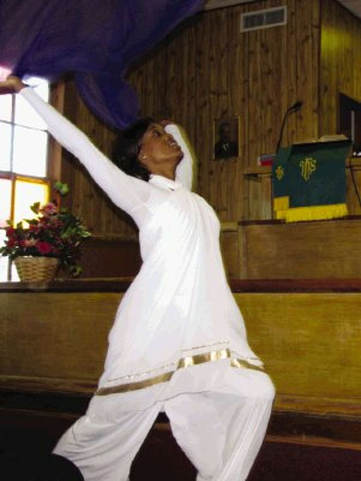 A dancer with Thomas Chapel United Methodist Church’s High Praise Ministry performed a Liturgical Dance at the chapel’s 145th anniversary Sunday.