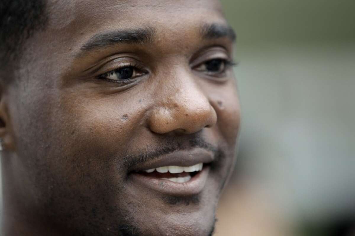 U.S. sprinter Justin Gatlin smiles as he answers questions after a press conference in Daegu, South Korea, on Wednesday. The World Athletics Championships run from Saturday through Sept. 4.