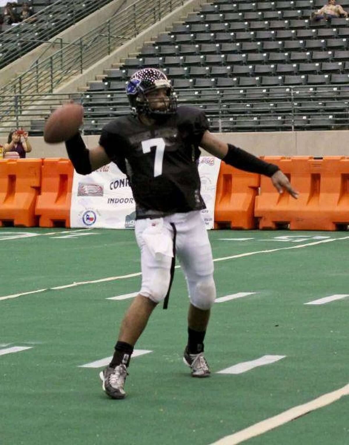 Conroe Jaguar quarterback Andre Roy, who threw four TD passes, including the game-winner in overtime, goes back to pass in Saturday night’s All-Star Game at the Lone Star Expo Center.