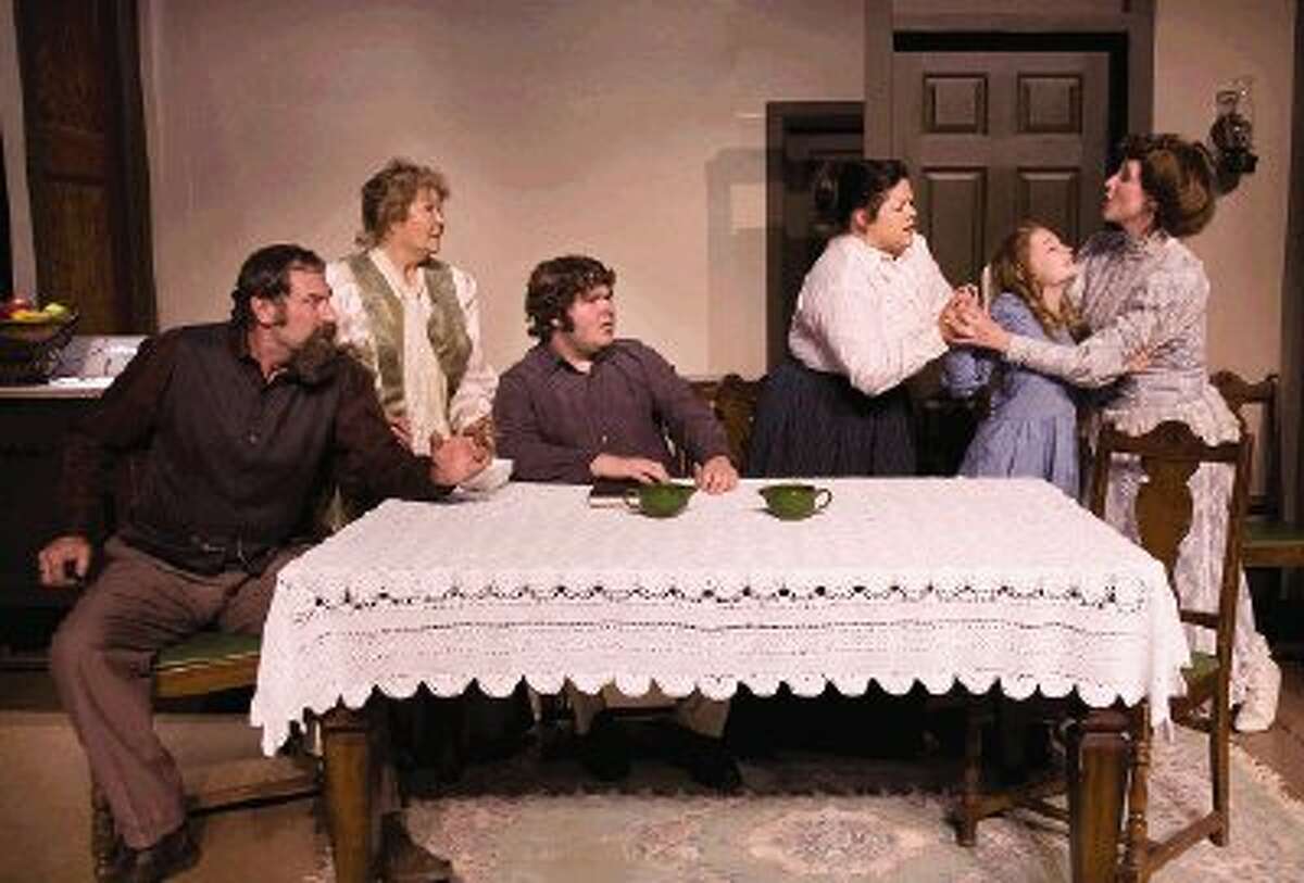 The table scene of “The Miracle Worker” provides a dramatic moment in the play, featuring, from left, Katt Gilcrease, Katie Kelly, Garrett Wilson, Layci Jones, Lena Torluemke and Beverly Watkins.