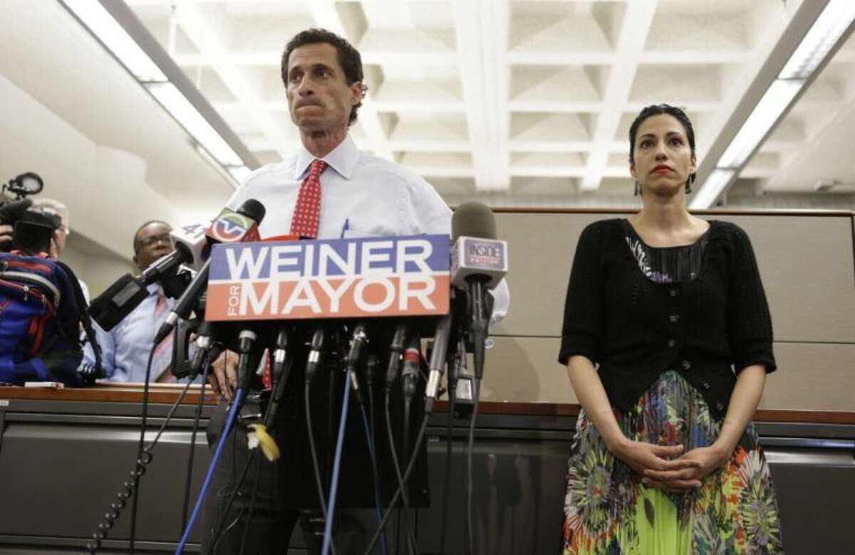 New York mayoral candidate Anthony Weiner speaks during a news conference alongside his wife Huma Abedin at the Gay Men’s Health Crisis headquarters, Tuesday in New York. The former congressman says he’s not dropping out of the New York City mayoral race in light of newly revealed explicit online correspondence with a young woman.