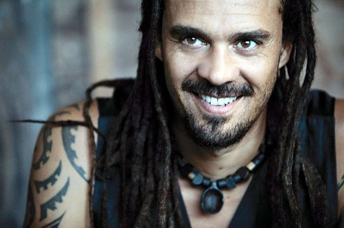 Michael Franti, pictured, and his band Spearhead open for Carlos Santana Saturday night at the Cynthia Woods Mitchell Pavilioin in The Woodlands.