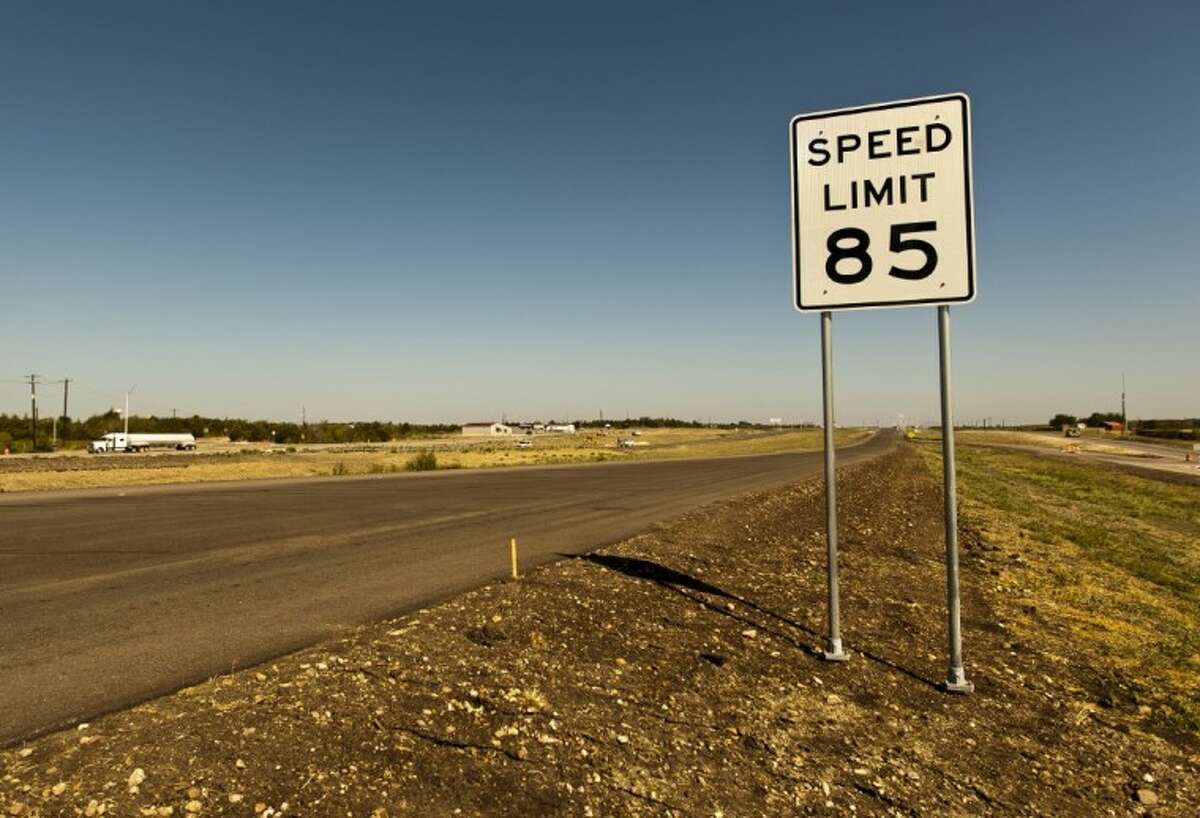 An 85 mph speed limit sign is placed on the 41-mile-long toll road in Austin, near the increasingly crowded Interstate between Austin and San Antonio on Thursday.