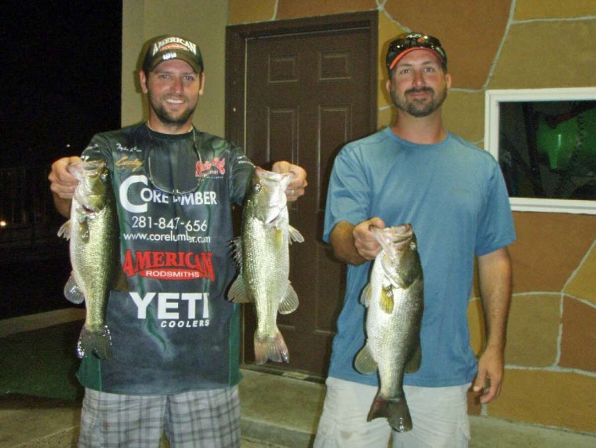Photo by Clint Lipham and Taylor Robbins won the Conroe Bass Tuesday Night Tournament on Sept. 4 with a stringer weighing 9.02 pounds.